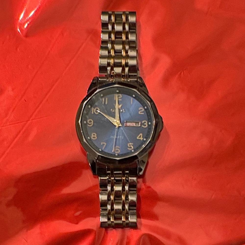 Black and Gold Analog Watch